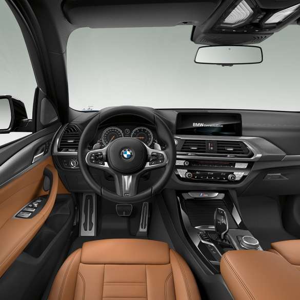 BMW X3 M40i and BMW X3 M40d, cockpit. BMW X3 M40i and BMW X3 M40d, interior, cockpit with M leather steering wheel and M Sport seats.