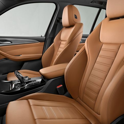 BMW X3 M40i and BMW X3 M40d, interior. BMW X3 M40i and BMW X3 M40d, sporty and comfortable interior with sports seats.