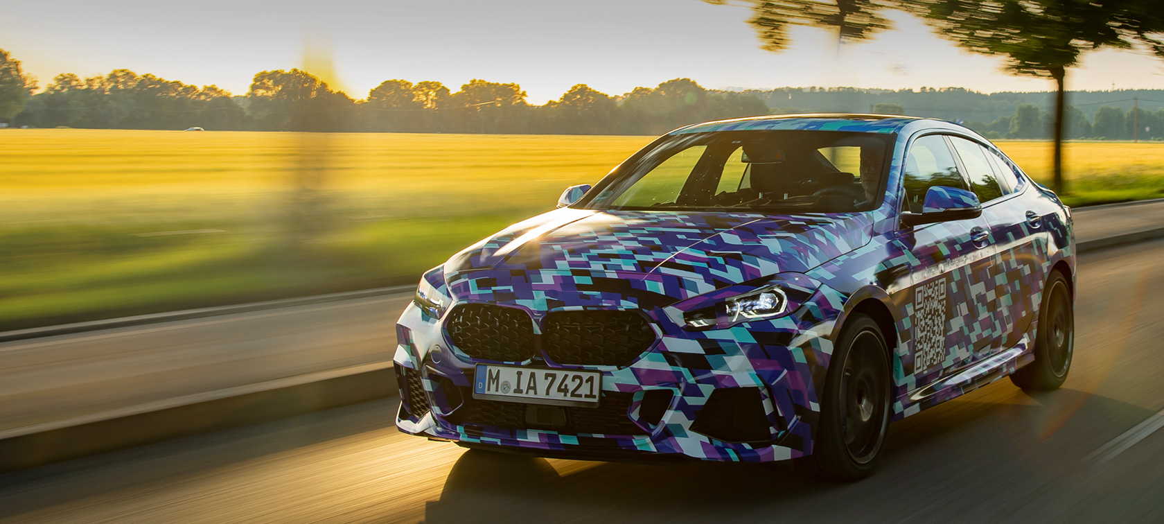 The first-ever BMW 2 Series Gran Coupé BMW 2 Series Gran Coupé F44 driving introduction first pictures exterior design three-quarter front view disguised prototype car