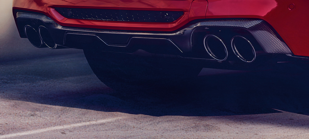 BMW X4 M Сompetition, задний диффузор из карбона. BMW X4 M Сompetition в Toronto Red металлик, экстерьер, пакет экстерьера M Carbon, задний диффузор из карбона.